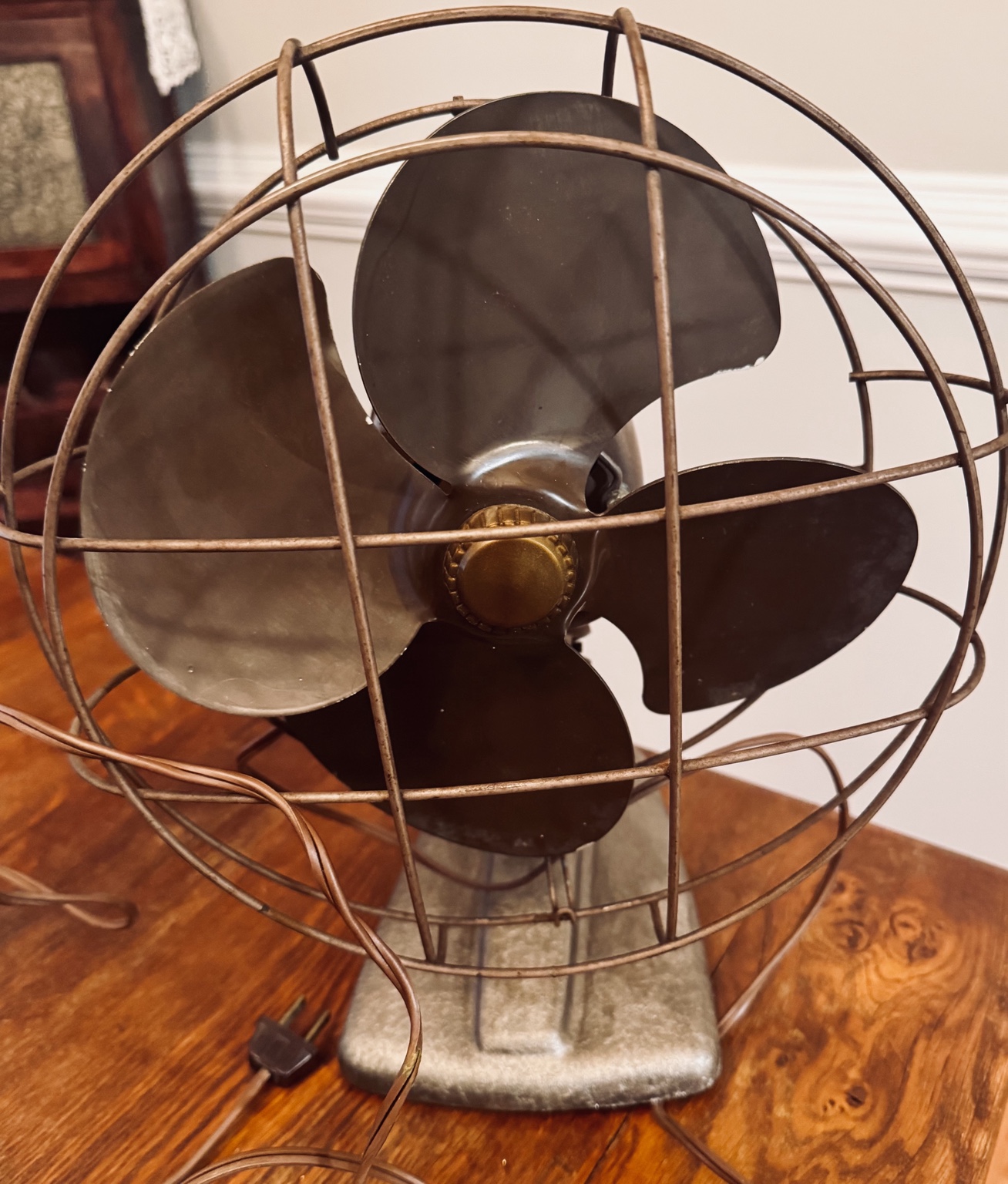 Vintage electric fan queued for service