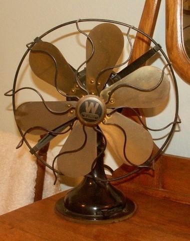 Six-blade Westinghouse brass fan being shipped to the workshop